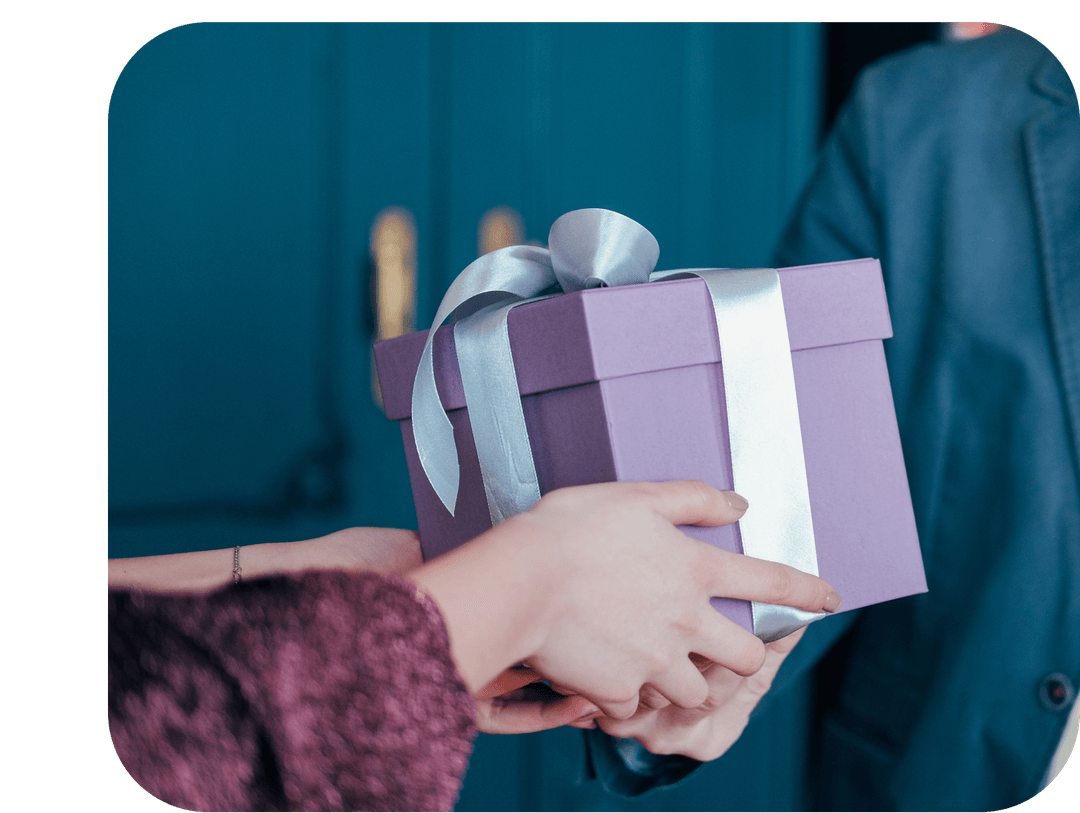 Woman get gift box with silver ribbon